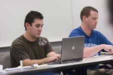 Students working with a computer - Pepperdine University