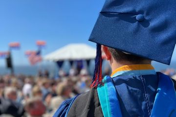 SPP graduate looking at the commencement ceremony 