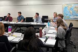 students at table for discussion