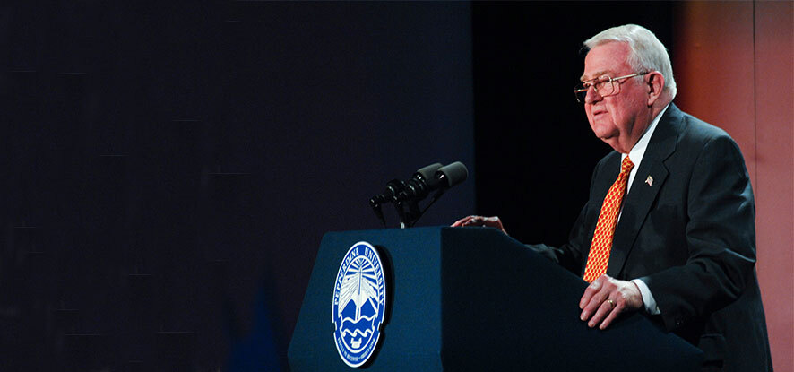 Edwin Meese giving speech at podium