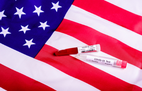 American Flag and COVID-19 test tubes