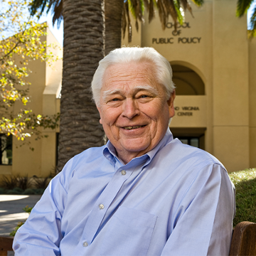 Gordon Lloyd in front of SPP Building