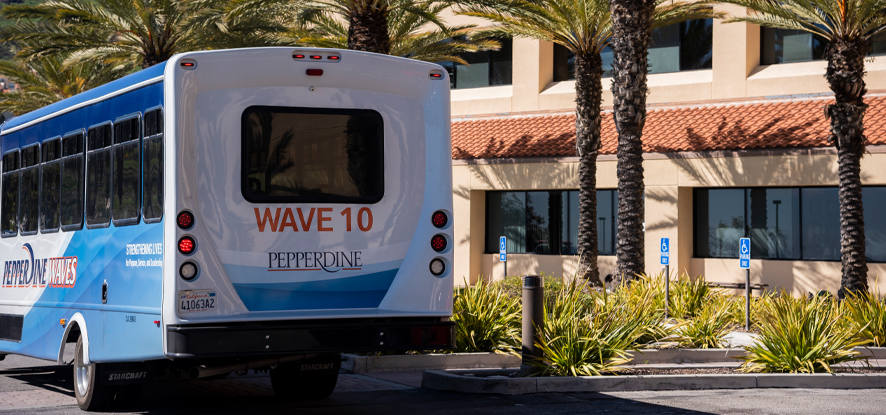 Pepperdine University Shuttle parked in front of building