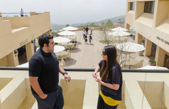 Students on Balcony Talking to Each Other 